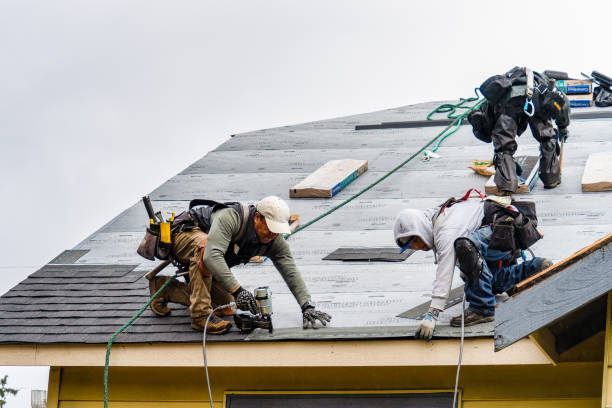 Professional Gutter Installation technician working in Bonita Springs, FL